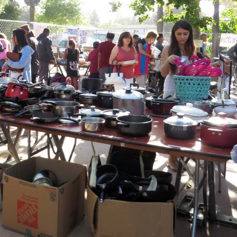 Shoppers browse household items at last year’s GIVE! Sale